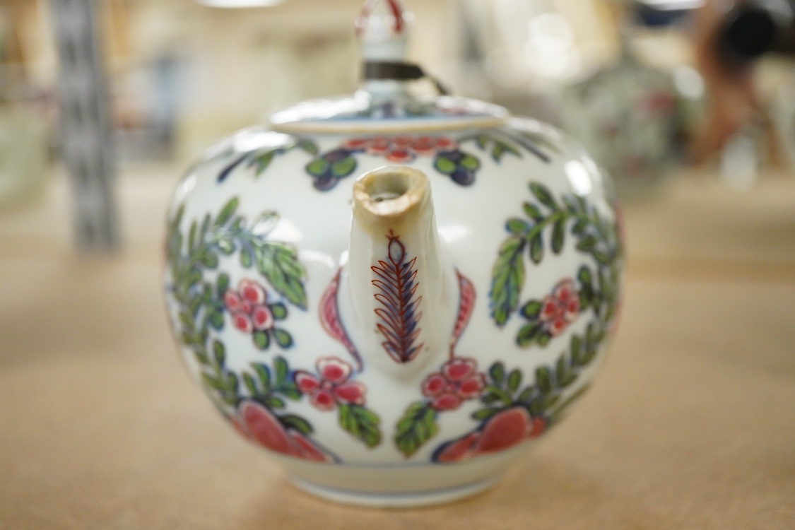 Three 18th century Chinese porcelain European enamelled teapots and covers, tallest - 13cm high